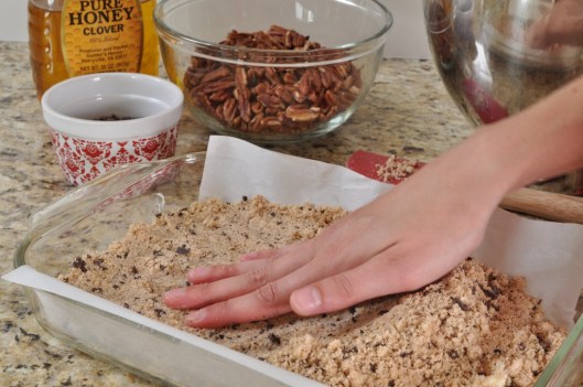 Patting the crust in the pan