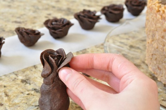 Press five petals onto second row