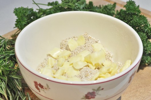 Cut in flakes of butter